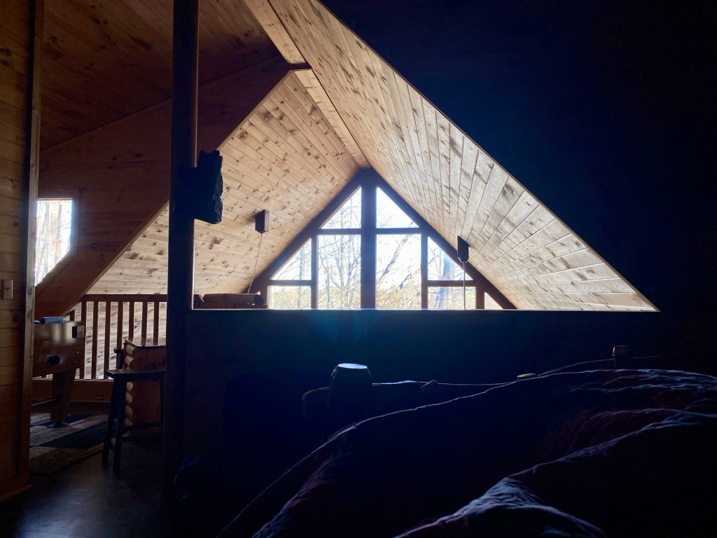 a bedroom with a window